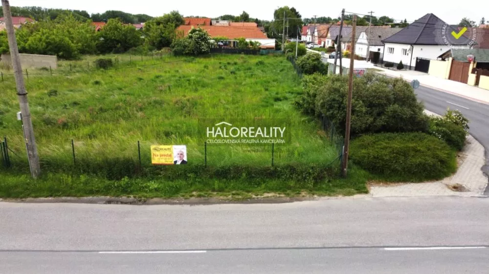 Pozemok pre rod. domy na predaj 1515m2, Šoporňa, 154421_1